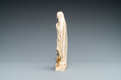 A polychromed and gilded ivory figure of a Madonna, 19th C.