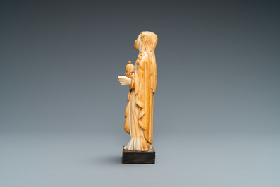 An Indo-Portuguese ivory figure of Mary Magdalen with an ointment jar, probably Goa, 17/18th C.