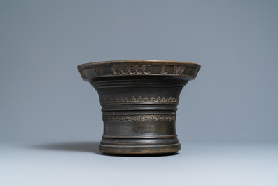 A large bronze mortar dated 1557 and inscribed for Martin Doeulle, North of France