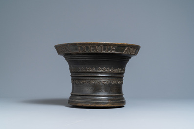 A large bronze mortar dated 1557 and inscribed for Martin Doeulle, North of France