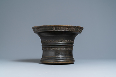 A large bronze mortar dated 1557 and inscribed for Martin Doeulle, North of France
