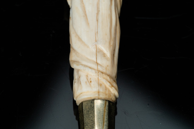 An ivory-handled knife depicting the theological virtue of faith and an ivory folding tailor's ruler, 17/18th and 19th C.