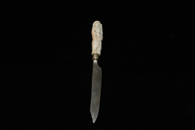 An ivory-handled knife depicting the theological virtue of faith and an ivory folding tailor's ruler, 17/18th and 19th C.