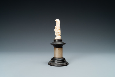 An ivory bust of a lady with a raised hairdress, 19th C.