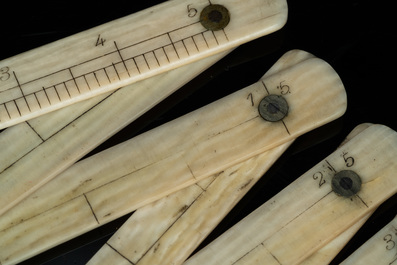 An ivory-handled knife depicting the theological virtue of faith and an ivory folding tailor's ruler, 17/18th and 19th C.