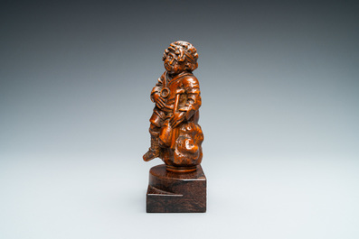 A boxwood figure of a beggar, Flanders, 17/18th C.