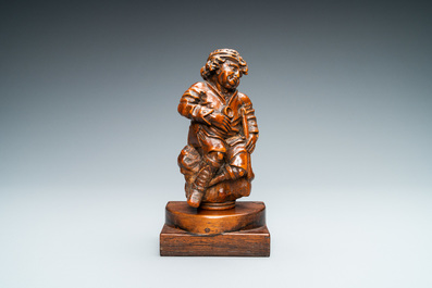 A boxwood figure of a beggar, Flanders, 17/18th C.