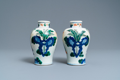 A pair of Chinese wucai 'meiping' vases, 19th C.