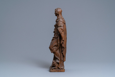 An oak figure of a female saint crushing a griffin, 2nd half 16th C.
