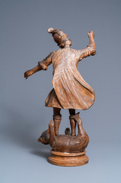 Une statue de Saint Michel terrassant le dragon en ch&ecirc;ne sculpt&eacute;, 17&egrave;me
