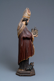 A large polychromed wooden figure of Saint Amand, 17th C.