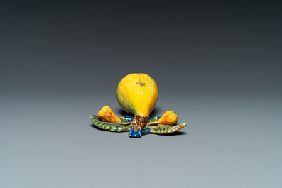 A polychrome Dutch Delft group of three pears, 18th C.