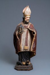 Une grande statue de Saint Amand en bois sculpt&eacute; et polychrom&eacute;, 17&egrave;me