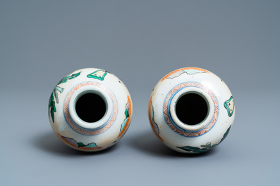 A pair of Chinese wucai 'meiping' vases, 19th C.