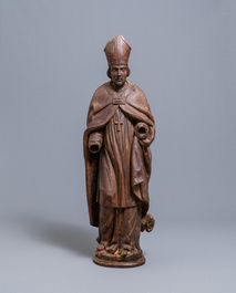 A large limewood figure of a bishop, 18th C.