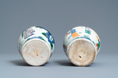 A pair of Chinese wucai 'meiping' vases, 19th C.