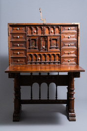 A Spanish bronze-mounted oak 'bargue&ntilde;o' or cabinet on stand, 16th C.