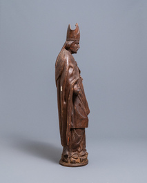 A large limewood figure of a bishop, 18th C.