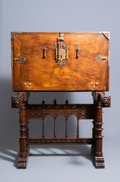 A Spanish bronze-mounted oak 'bargue&ntilde;o' or cabinet on stand, 16th C.