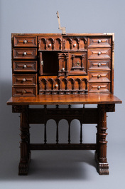 A Spanish bronze-mounted oak 'bargue&ntilde;o' or cabinet on stand, 16th C.