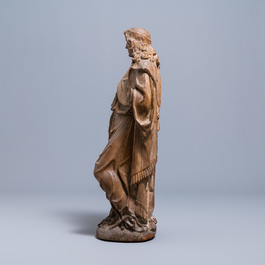 An oak figure of an angel holding the Instruments of the Passion, Germany or Mosan region, 16th C.