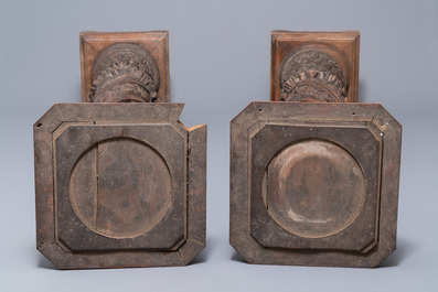 A pair of reticulated carved oak Corinthian columns with cherub heads and vines, 17th C.