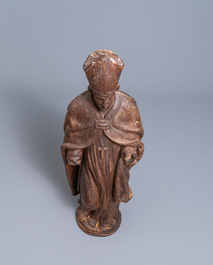 A large limewood figure of a bishop, 18th C.