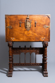 A Spanish bronze-mounted oak 'bargue&ntilde;o' or cabinet on stand, 16th C.