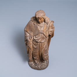 An oak figure of an angel holding the Instruments of the Passion, Germany or Mosan region, 16th C.