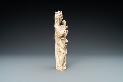 An ivory figure of a Madonna with child, probably France, 19th C.
