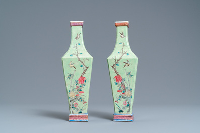 A pair of Chinese famille rose green-ground vases with floral design, 19th C.