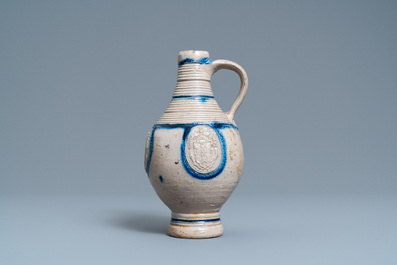 A German stoneware ewer with the Amsterdam coat of arms, Westerwald, dated 1644