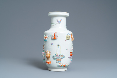 A Chinese famille rose vase with applied 'antiquities' design, Yongzheng