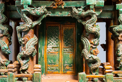 An exceptional large inscribed Chinese sancai-glazed pagoda, dated 1550, Ming