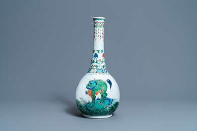 A large Chinese famille verte bottle vase with mythical beasts, Kangxi