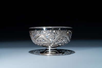 A Chinese silver 'dragon' tazza and a tripod dish with a handle, Sing Fat, Canton or Shanghai, 19/20th C.