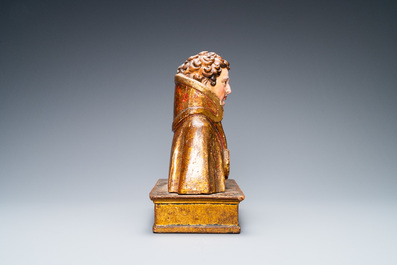 A polychromed and gilded wooden reliquary bust, Italy, 17th C.