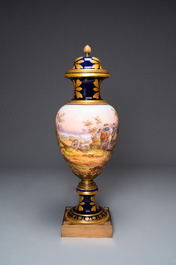 A large French Napoleonic S&egrave;vres-style vase with gilded bronze mounts, signed Desprez, 19th C.