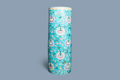 A large Chinese famille rose cylindrical vase with applied lotus scrolls, Jiaqing/Daoguang