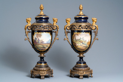 Une paire de grands vases en porcelaine dans le style de S&egrave;vres aux montures en bronze dor&eacute;, sign&eacute;s Le Berre, France, 19&egrave;me