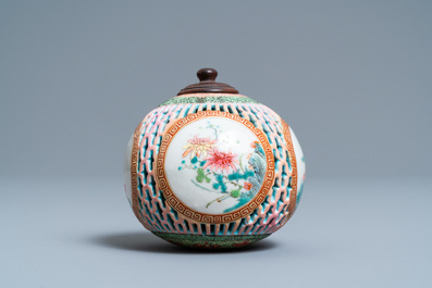 A Chinese reticulated famille rose pomander, Yongzheng