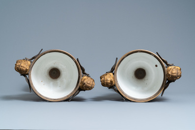 A pair of large French S&egrave;vres-style vases with gilded bronze mounts, signed Le Berre, 19th C.