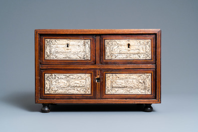 A small mahogany veneer cabinet with engraved bone plaques, Italy, 17th C.