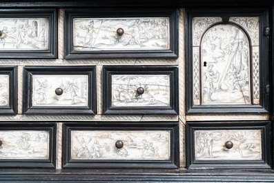 An ebony veneer cabinet with engraved ivory plaques, Italy, 17th C.