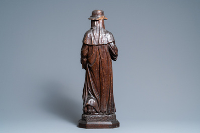 An oak figure of Saint Jerome, 16th C.