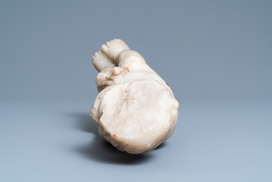 An alabaster figure of a putto with a bird on the knee, 17th C.