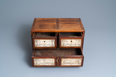 A small mahogany veneer cabinet with engraved bone plaques, Italy, 17th C.