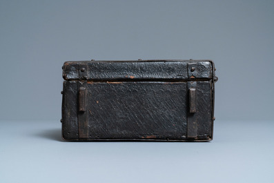 A chiseled leather-clad wooden travel casket, France, 15th C.