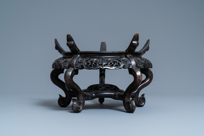 A large Chinese Canton famille rose bowl on wooden stand, 19th C.