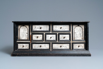 An ebony veneer cabinet with engraved ivory plaques, Italy, 17th C.